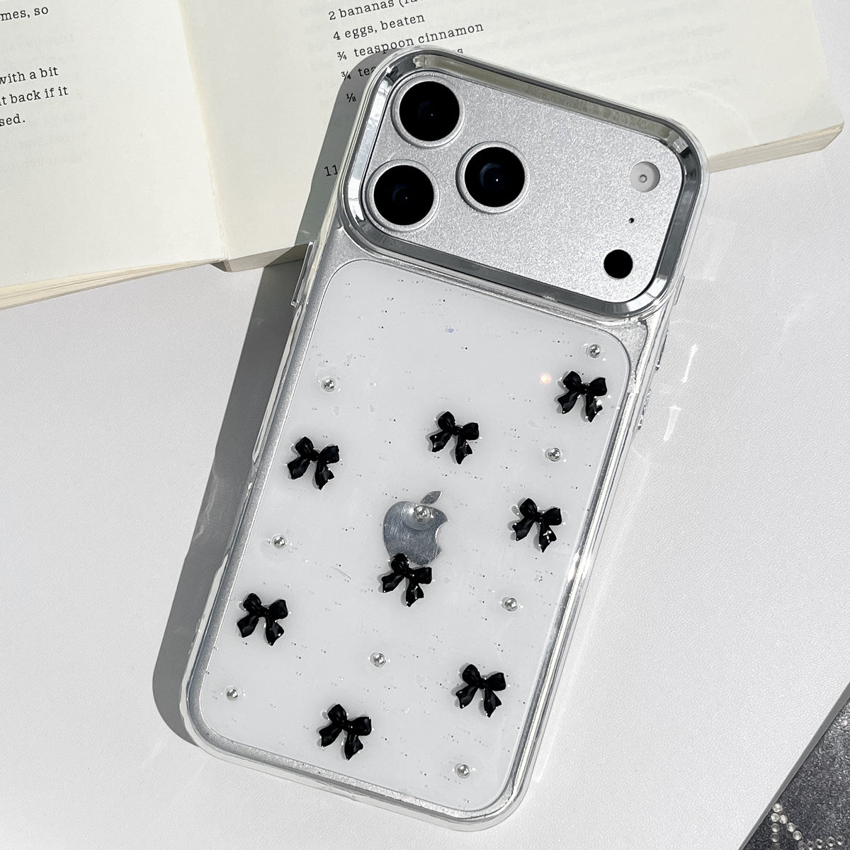 Stylish Clear Phone Case with Black Bow Charms—Cute Protective Cover