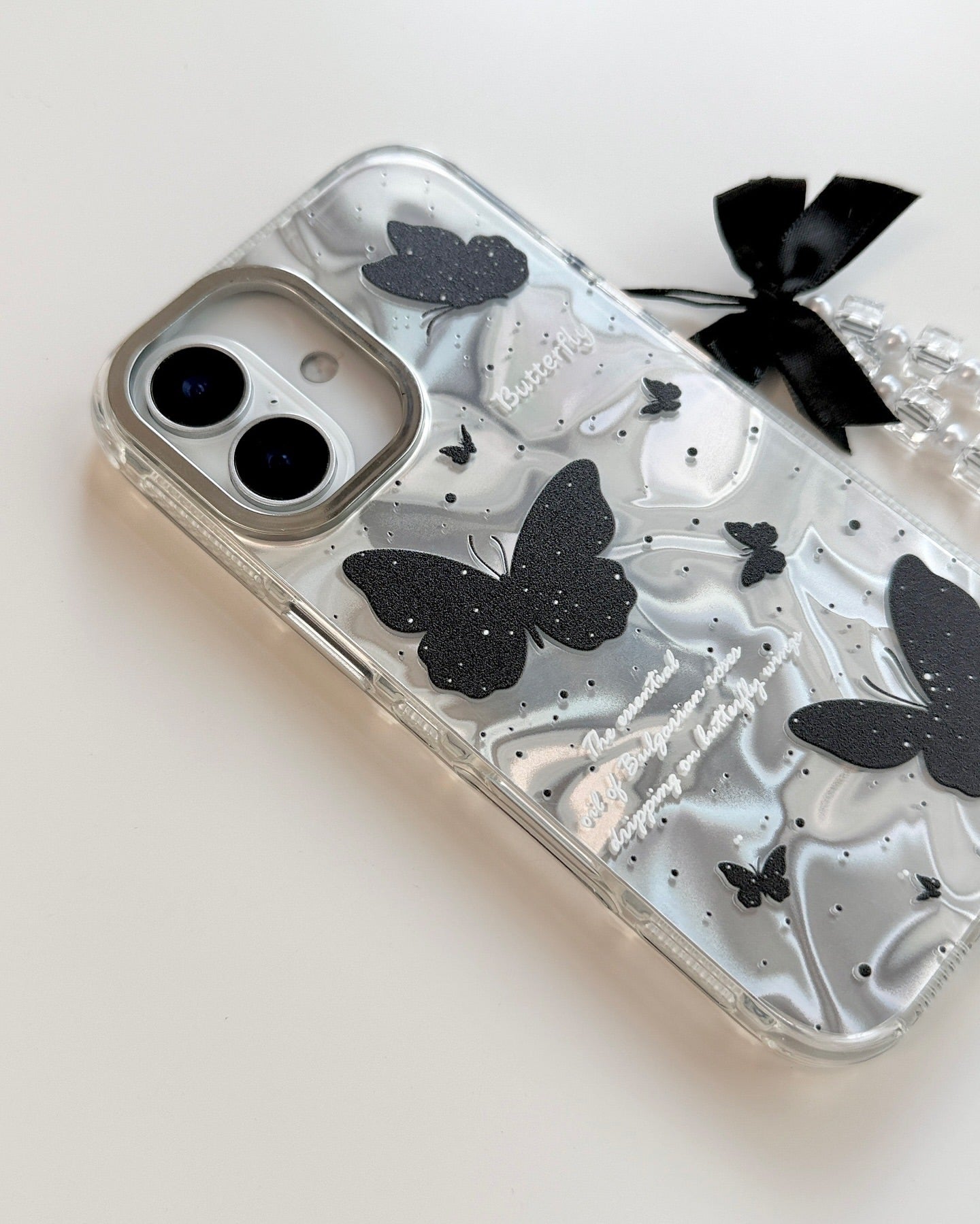 Butterfly Whispers holographic case with pendant bow charm