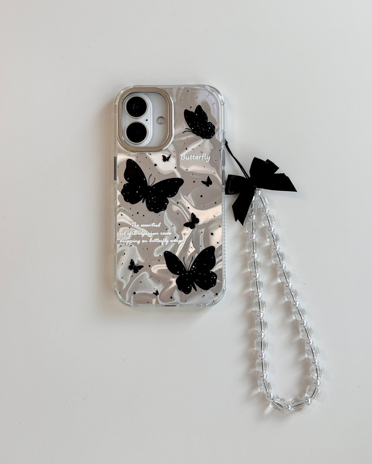Butterfly Whispers holographic case with pendant bow charm