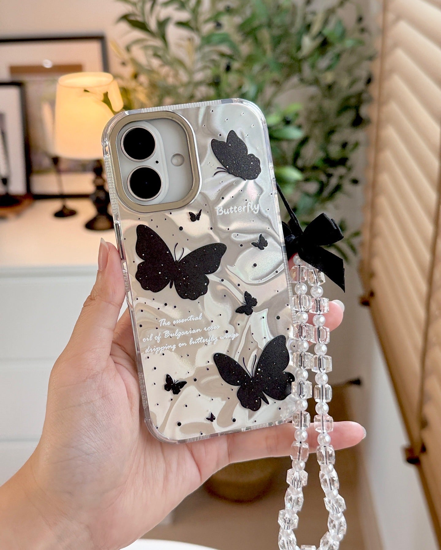Butterfly Whispers holographic case with pendant bow charm
