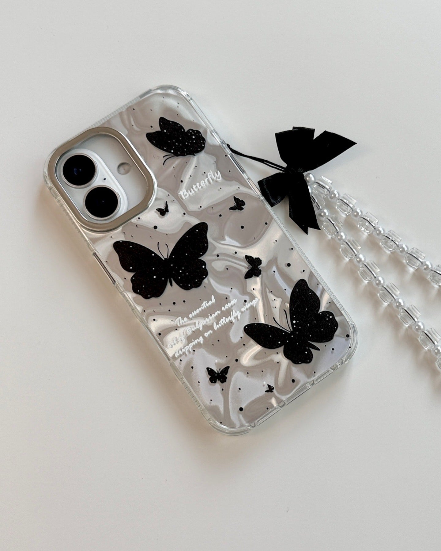 Butterfly Whispers holographic case with pendant bow charm