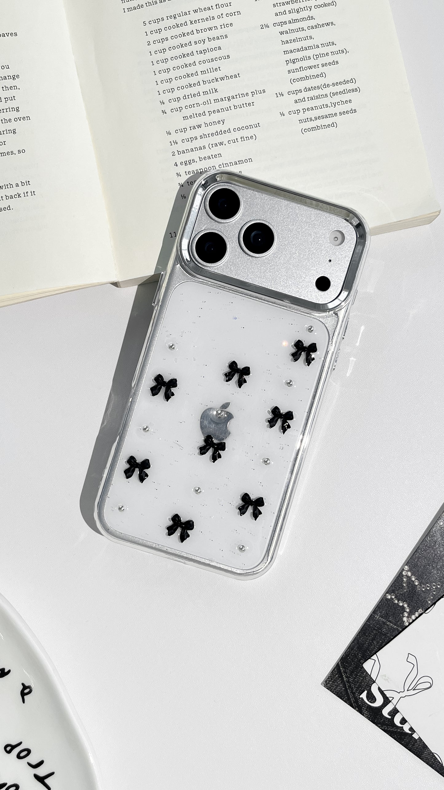 Stylish Clear Phone Case with Black Bow Charms—Cute Protective Cover