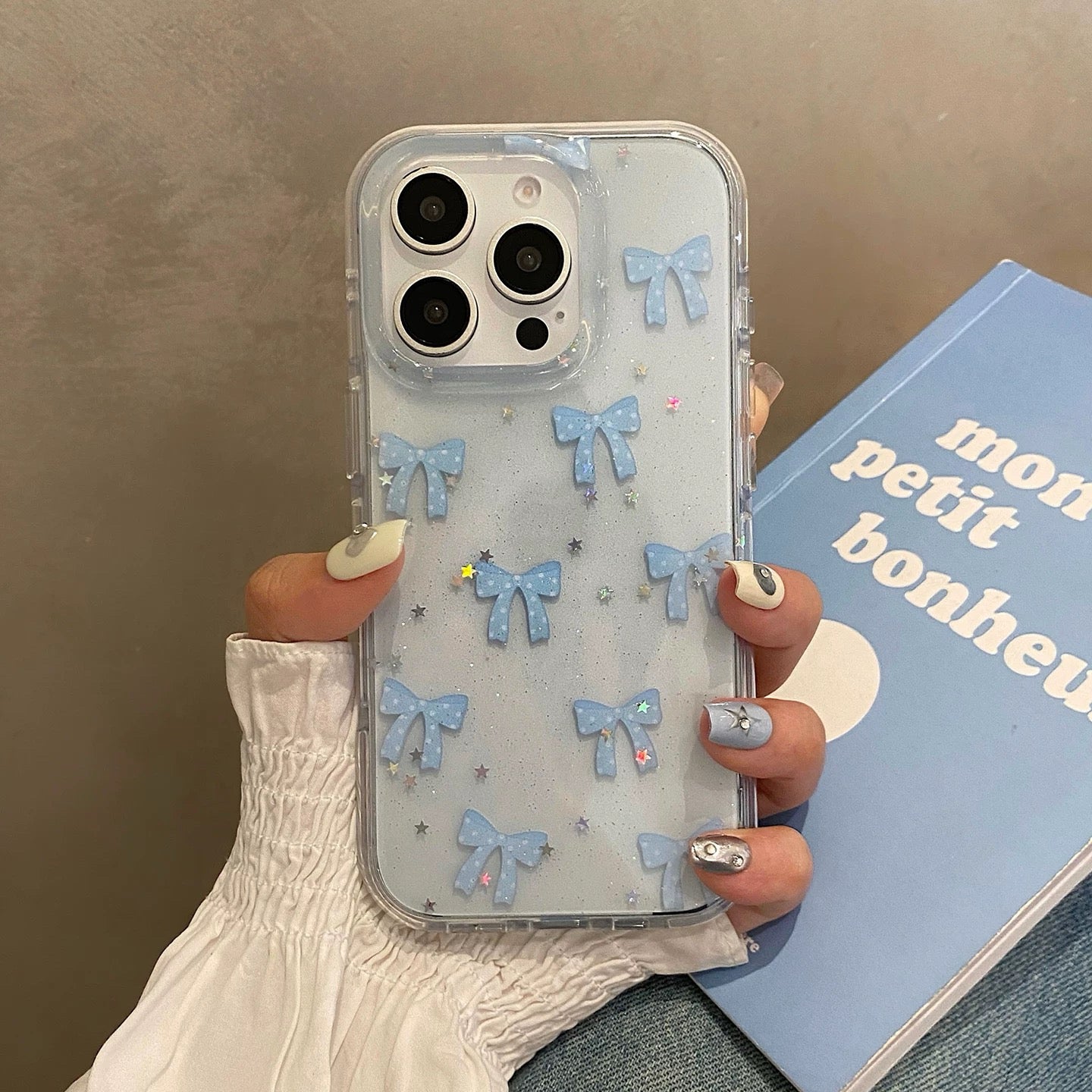 Clear Blue Bow Phone Case with Beaded Bracelet Strap – Cute & Protective Design