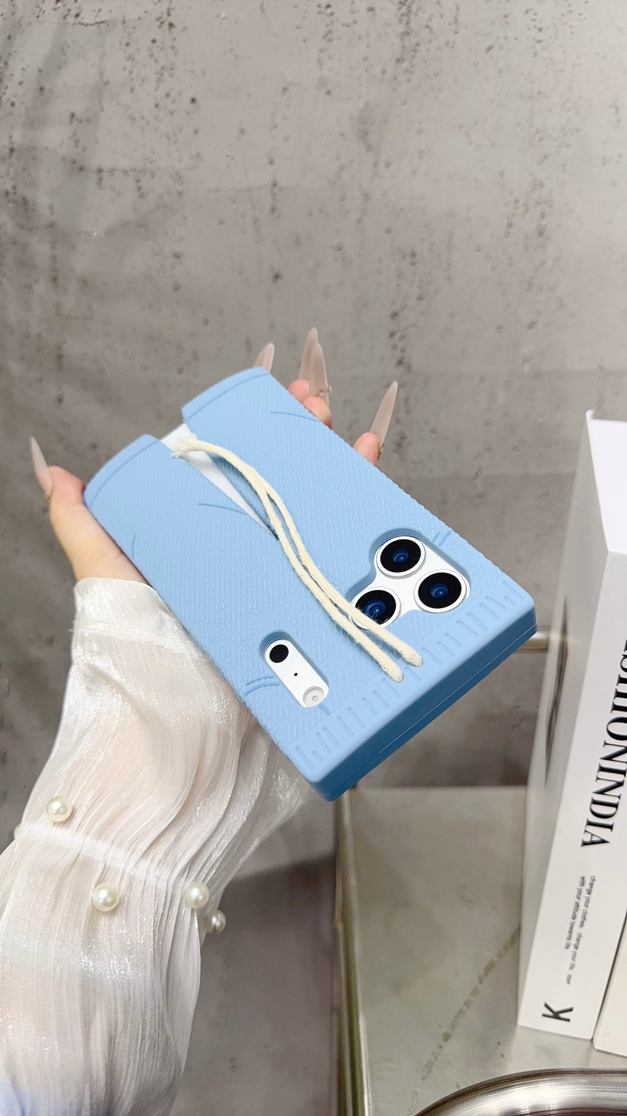 Trendy Blue Pants-Style Phone Case with Cute Drawstring Design