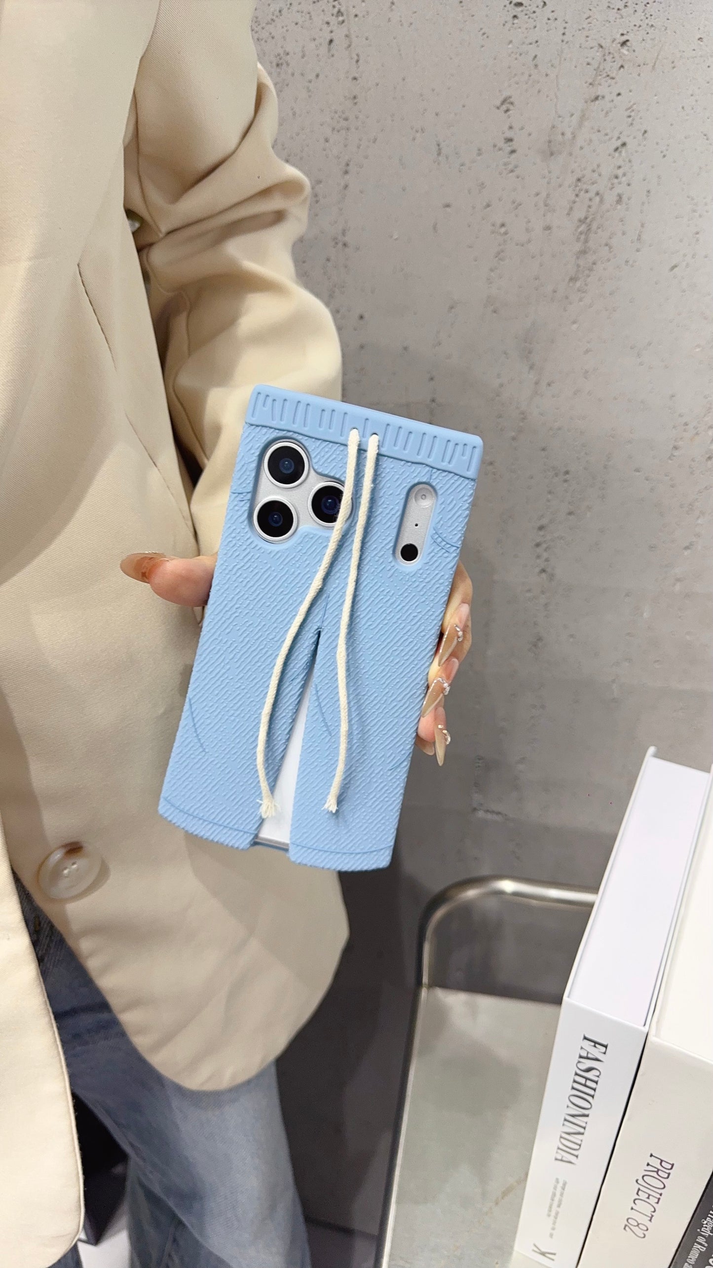 Trendy Blue Pants-Style Phone Case with Cute Drawstring Design