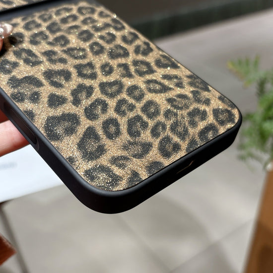 Wild Luxe Glitter Leopard iPhone Case with Black Wrist Strap – Bold Fashion Edition