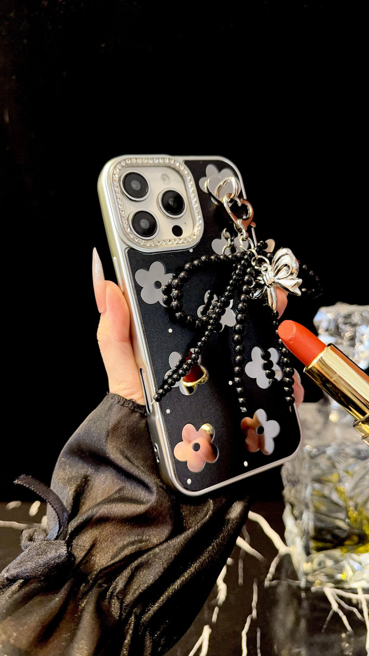 Black Floral iPhone Case with Silver Bow Charm – Elegant Glossy Protective Cover