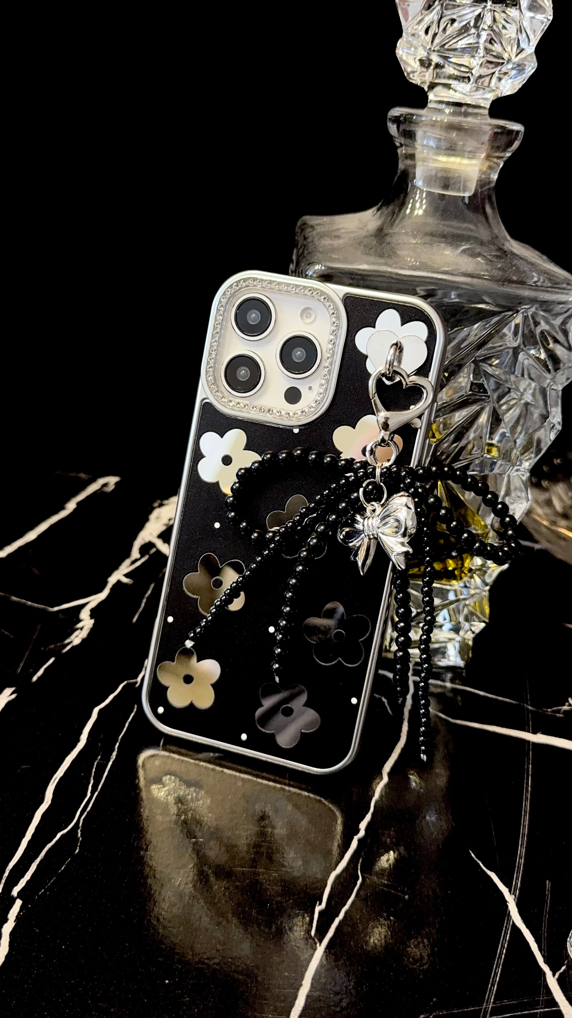 Black Floral iPhone Case with Silver Bow Charm – Elegant Glossy Protective Cover