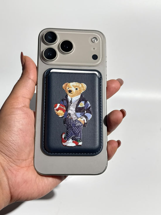 Navy teddy bear MagSafe wallet on iPhone