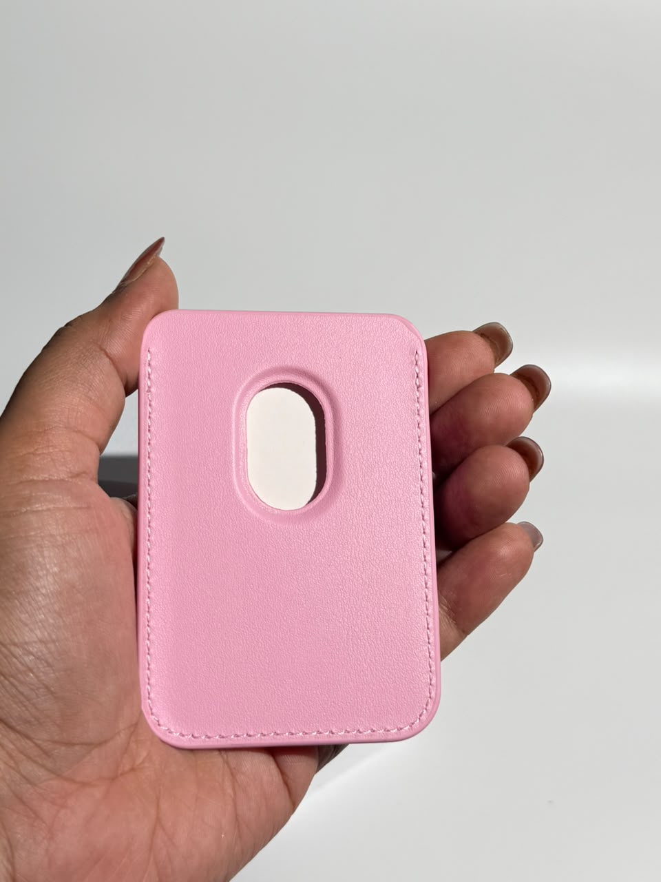 Pink MagSafe wallet back with finger cut-out