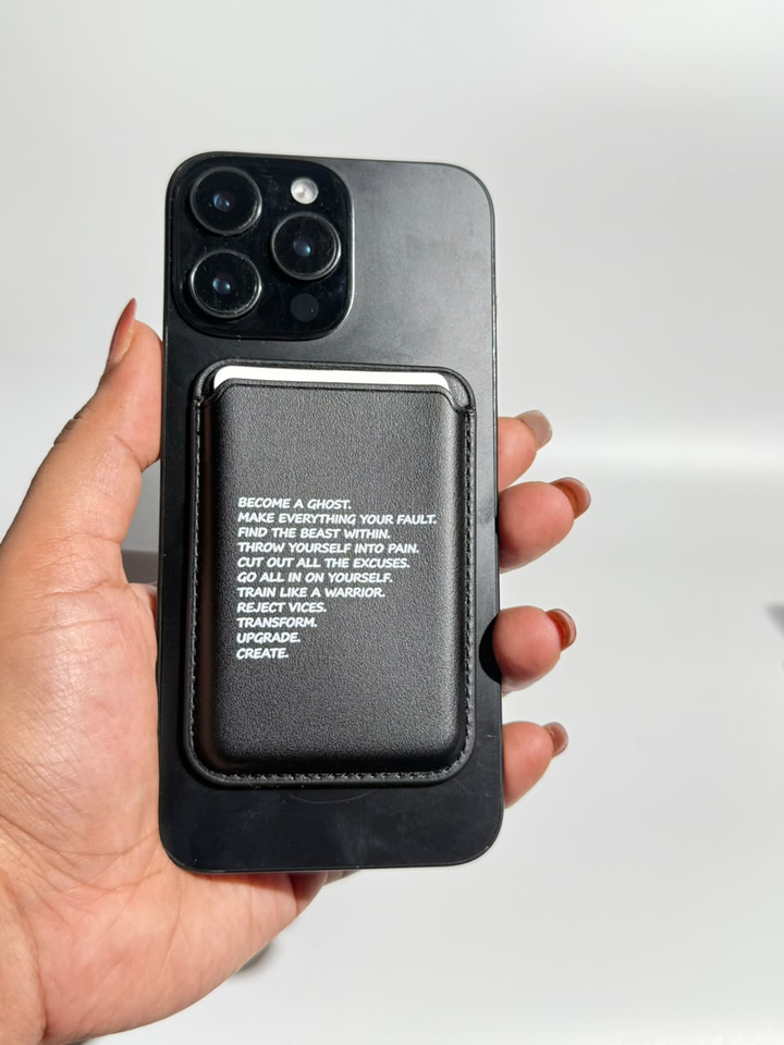 Black motivational quote MagSafe wallet on iPhone