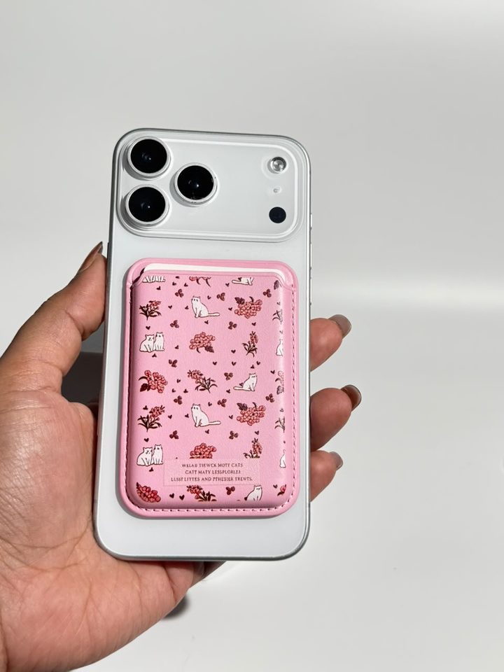 Pink kitty garden MagSafe wallet on iPhone