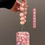 Pink Bloom case with Puff pendant charm