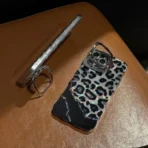 Luxe Leopard Glow Case with Charm and Phone Stand